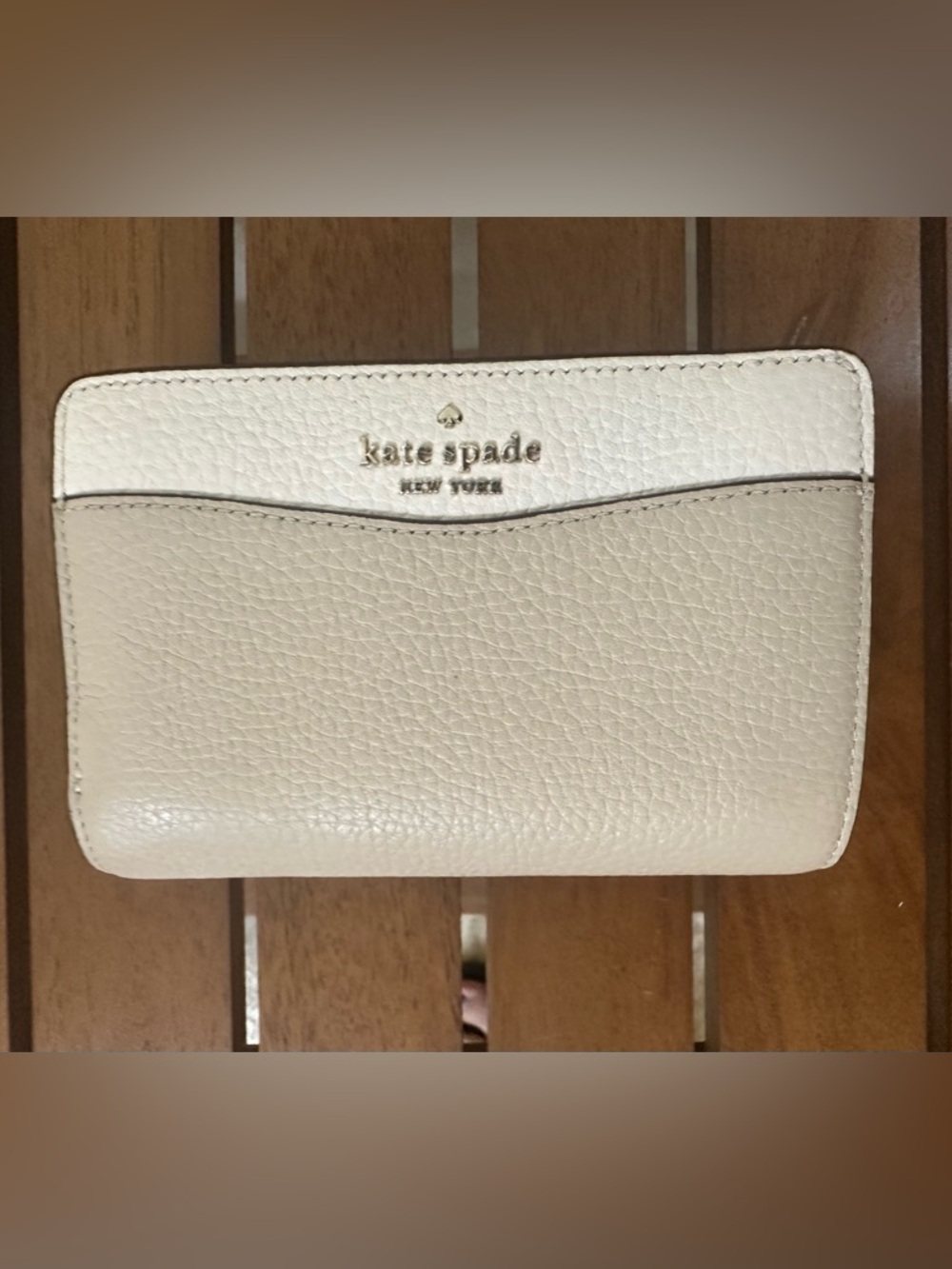 Kate Spade Pebbled Leather Continental Wallet in Cream and White with Gold Logo